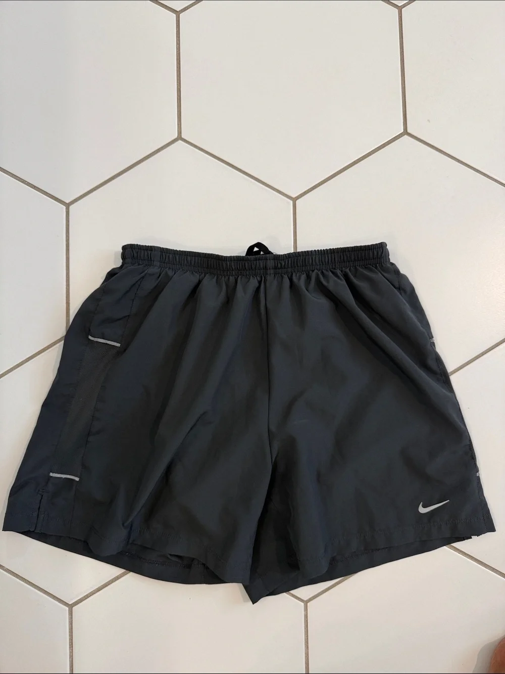 Nike Women's Dark Gray Athletic Shorts with Reflective Swoosh